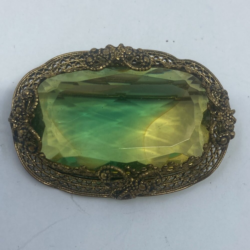 Vtg WEST GERMANY filigree brass yellow/green glass brooch